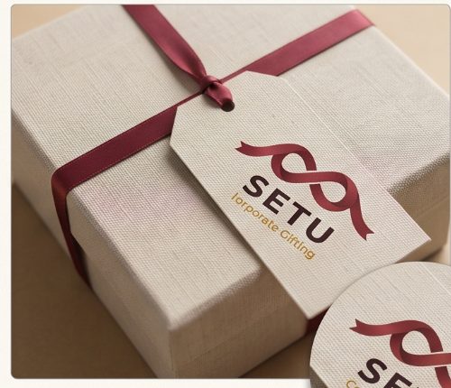 Linen gift box with a SETU swing tag and ribbon
